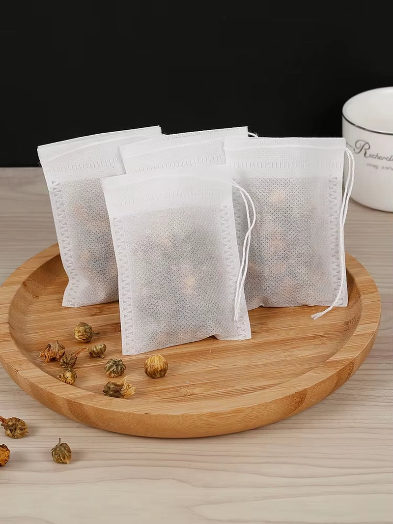 Tea Filter Bag 100Pcs Non-Woven Fabric Tea Infuser Bag Odorless Multipurpose Fine Mesh Tea Filter Bag with Drawstring Design For